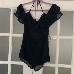 Black on black polkadot romper with cut out